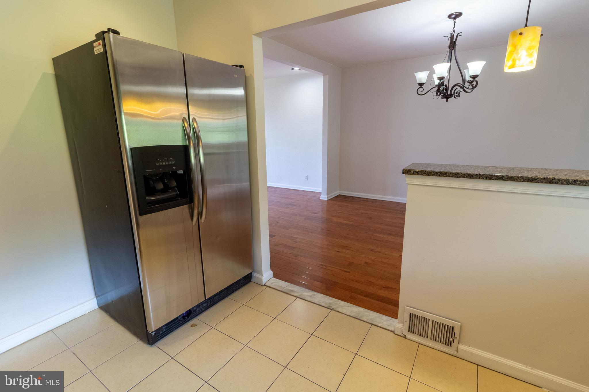 1545 Shoemaker Road Abington, PA 19001 - Photo 18 of 32 a view of a hallway with a refrigerator