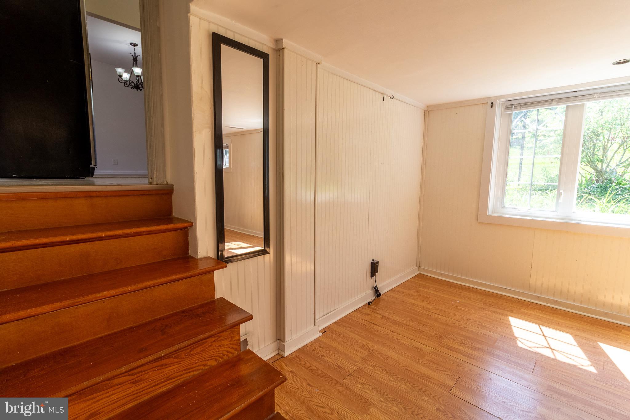 1545 Shoemaker Road Abington, PA 19001 - Photo 20 of 32 a view of empty room with wooden floor and fan