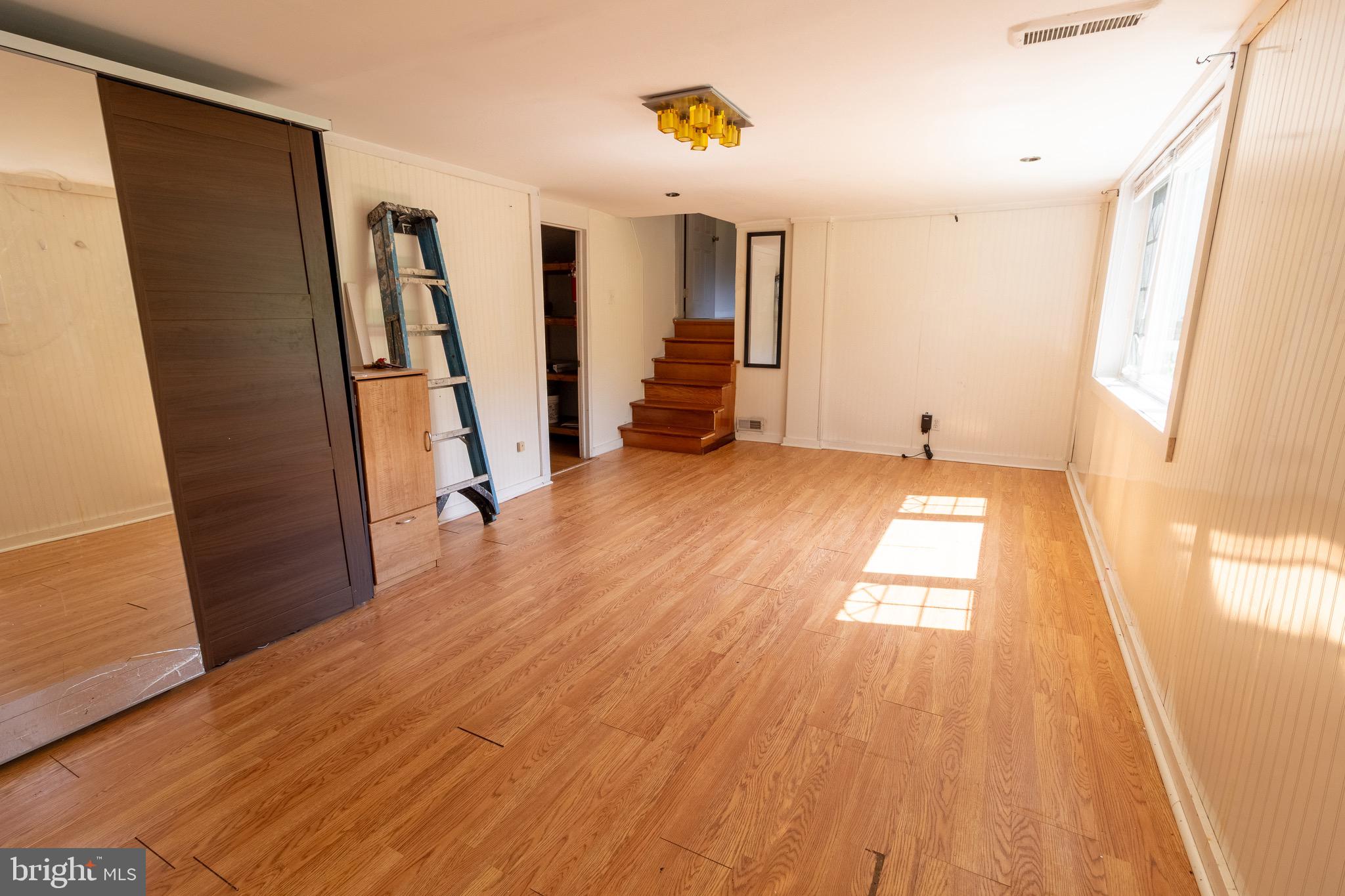1545 Shoemaker Road Abington, PA 19001 - Photo 21 of 32 a view of entryway with wooden floor and stairs