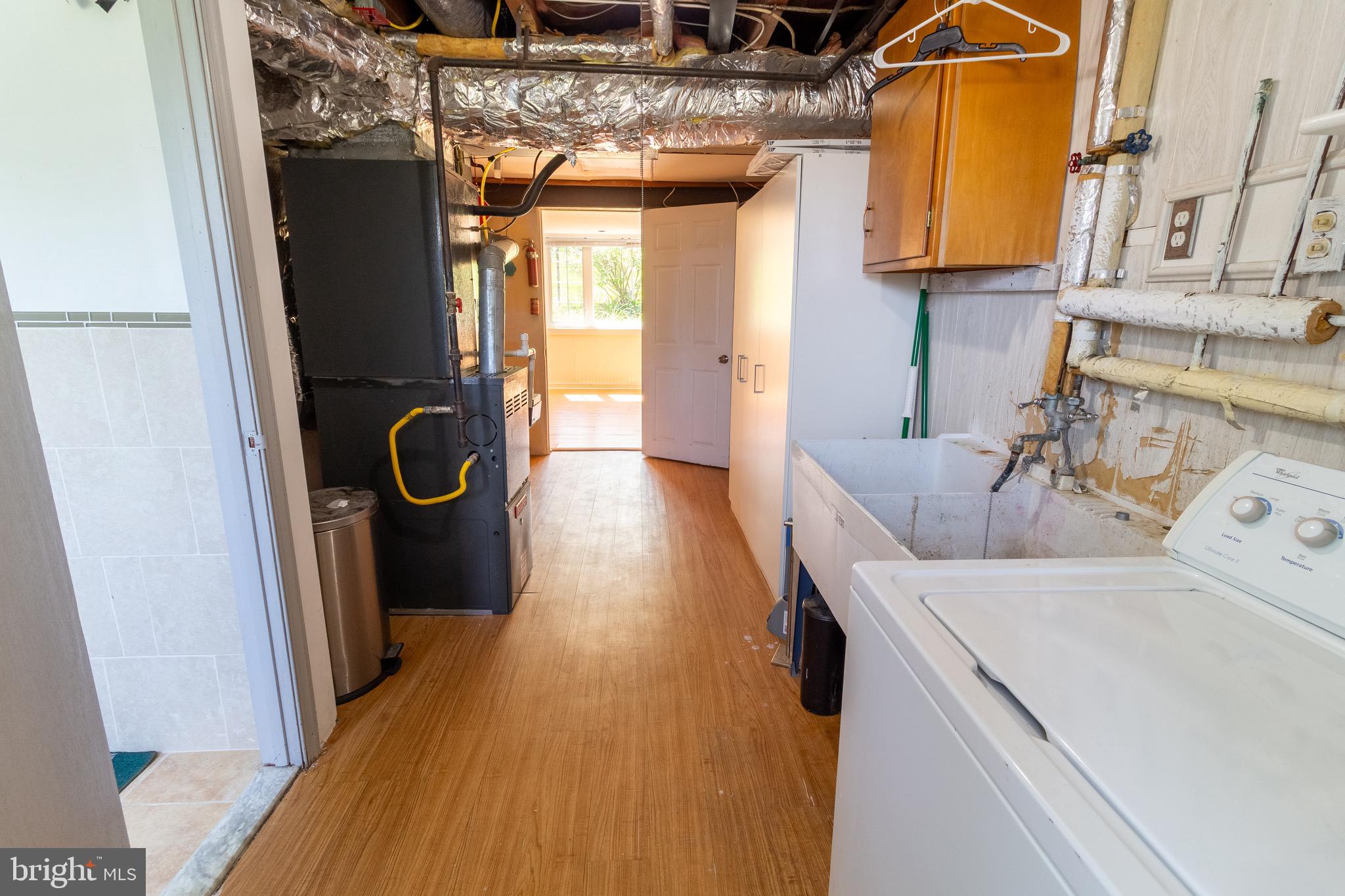 1545 Shoemaker Road Abington, PA 19001 - Photo 24 of 32 a utility room with dryer and washer