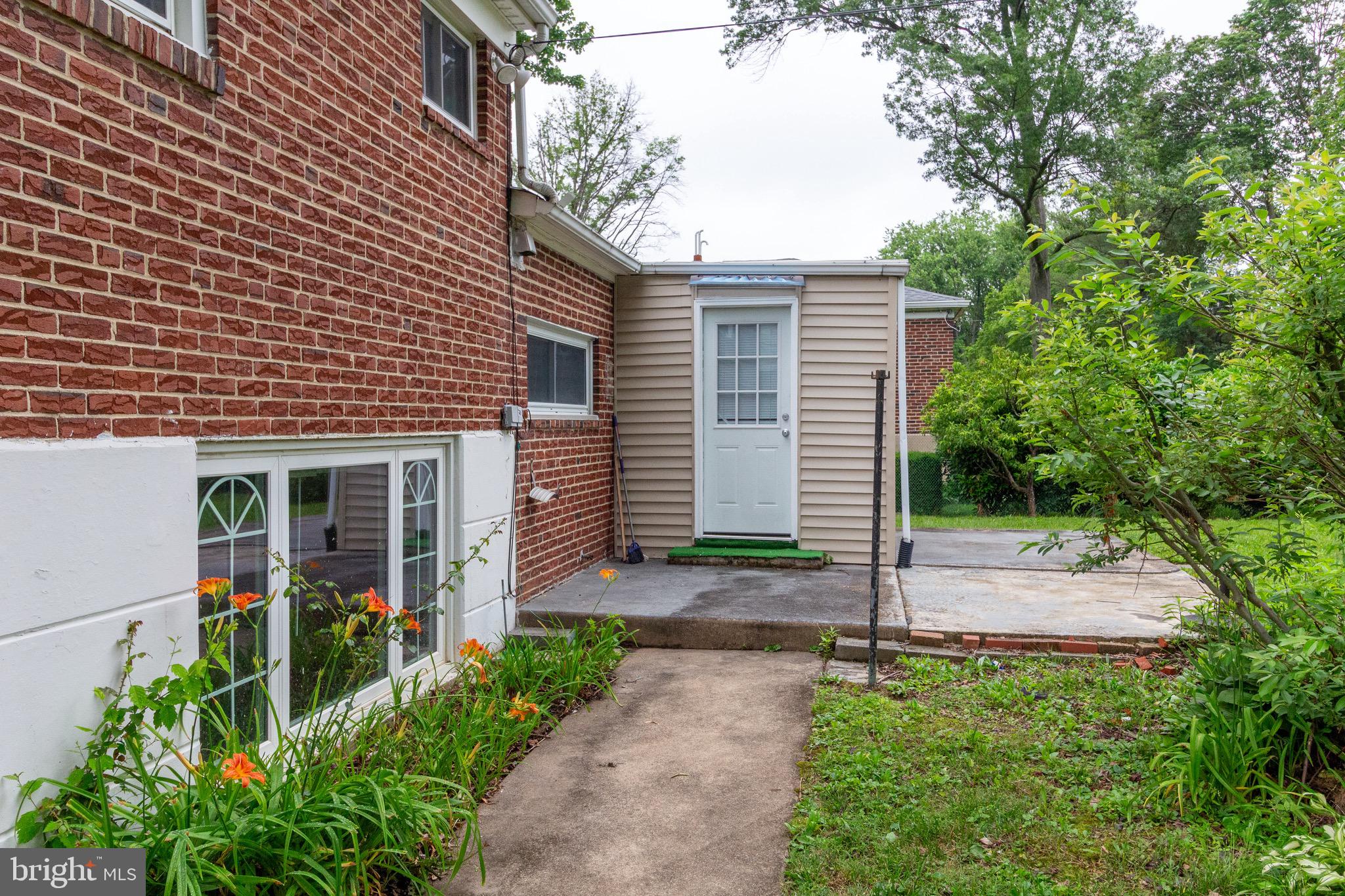 1545 Shoemaker Road Abington, PA 19001 - Photo 29 of 32 a front view of a house with garden