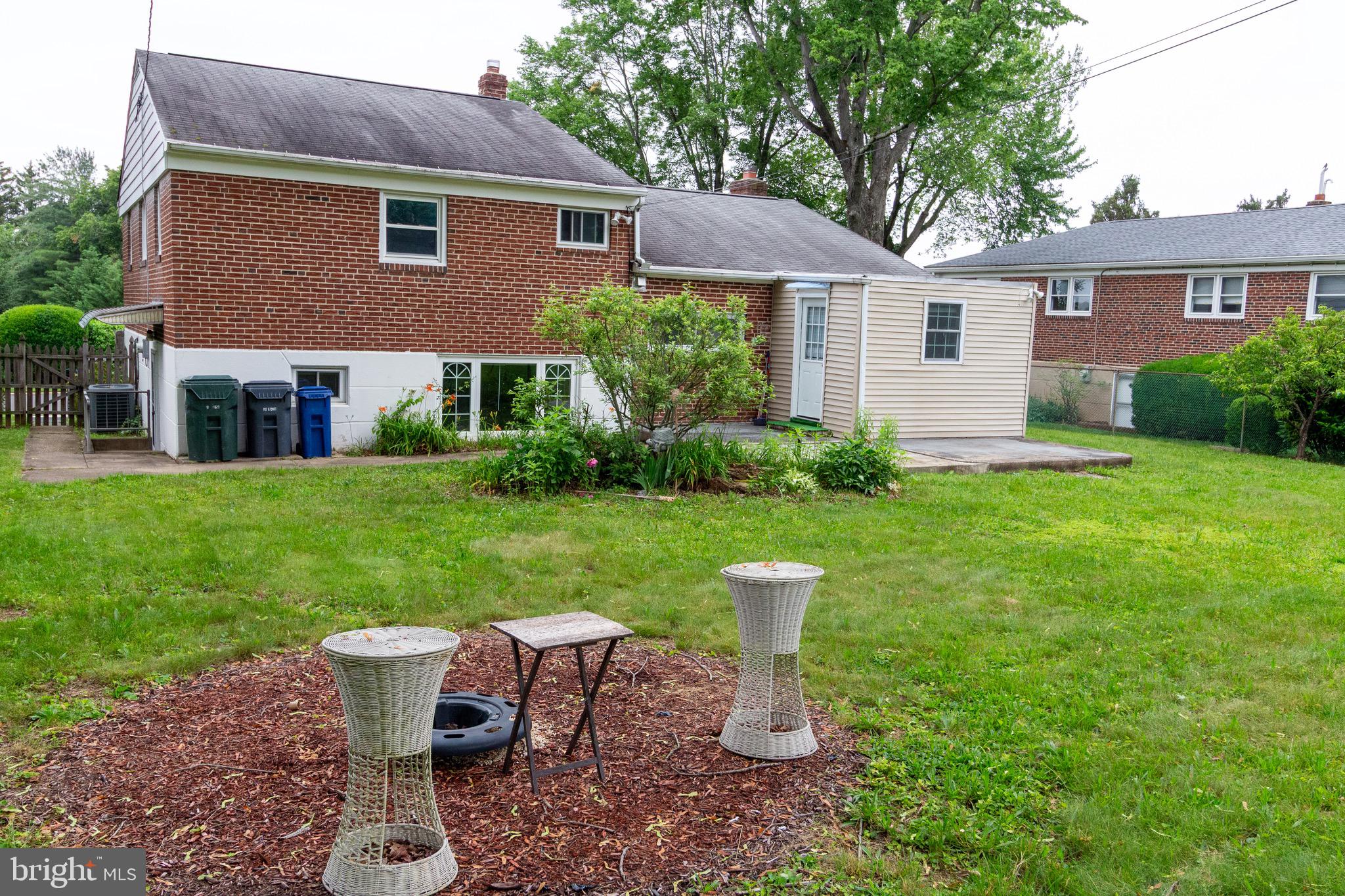1545 Shoemaker Road Abington, PA 19001 - Photo 30 of 32 a view of a house with backyard sitting area and garden