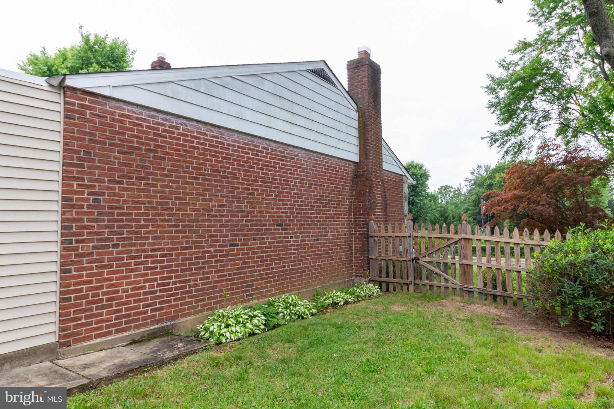 1545 Shoemaker Road Abington, PA 19001 - Photo 32 of 32 a view of a house with a backyard