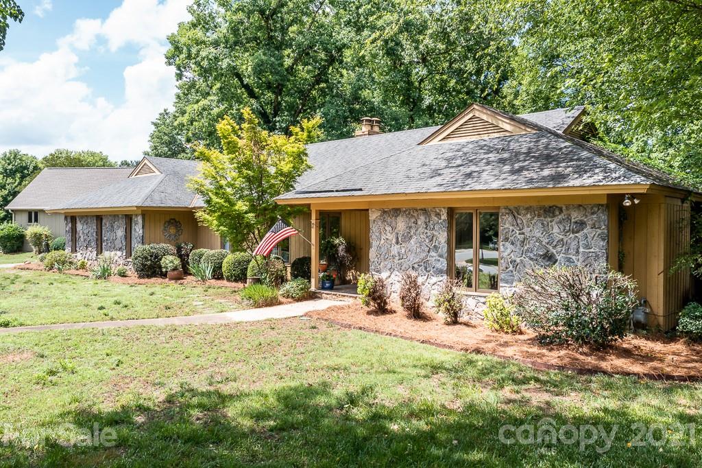 4401 Rounding Run Road Charlotte, NC 28277 - Photo 3 of 31 a front view of a house with a porch