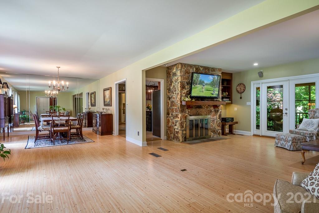 4401 Rounding Run Road Charlotte, NC 28277 - Photo 8 of 31 a view of a livingroom with furniture and a flat screen tv