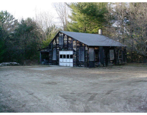 2417 New Sherborn Road Athol, MA 01331 - Photo 3 of 6 a house with trees in the background