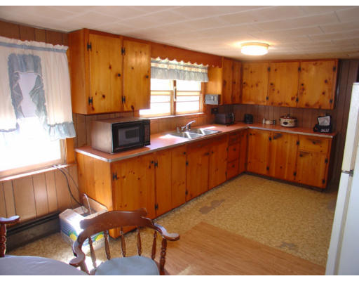 2417 New Sherborn Road Athol, MA 01331 - Photo 4 of 6 a kitchen with stainless steel appliances sink cabinets and window