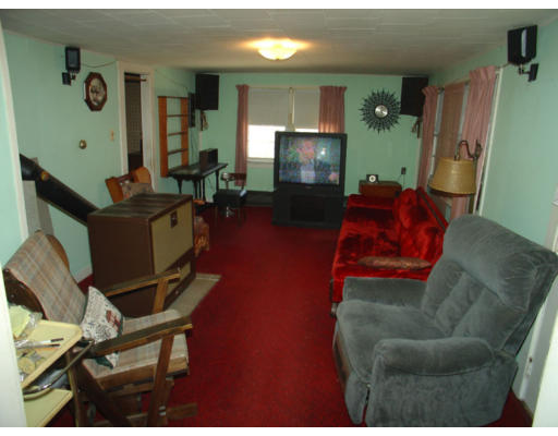 2417 New Sherborn Road Athol, MA 01331 - Photo 6 of 6 a living room with furniture and a flat screen tv