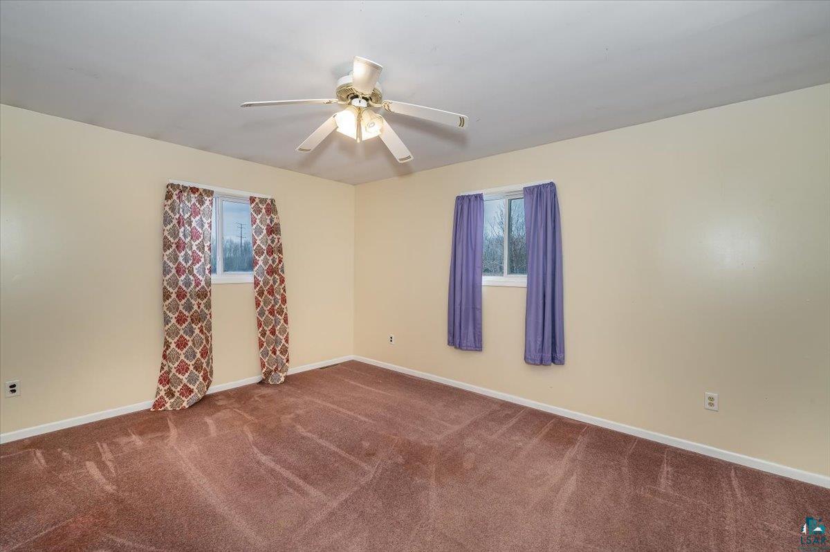 5303 South County Rd K South Range, WI 54874 - Photo 17 of 38 Main floor bedroom 2