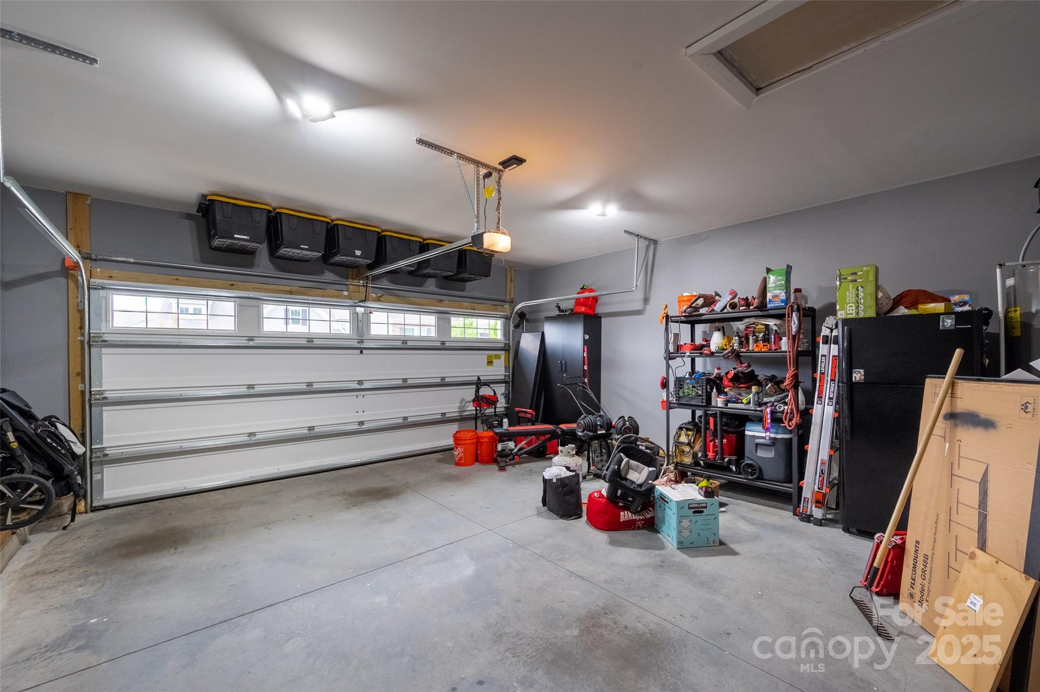 1024 Scotch Meadows Loop, Unit 32 Monroe, NC 28110 - Photo 17 of 19 a view of a garage with rack and bicycle
