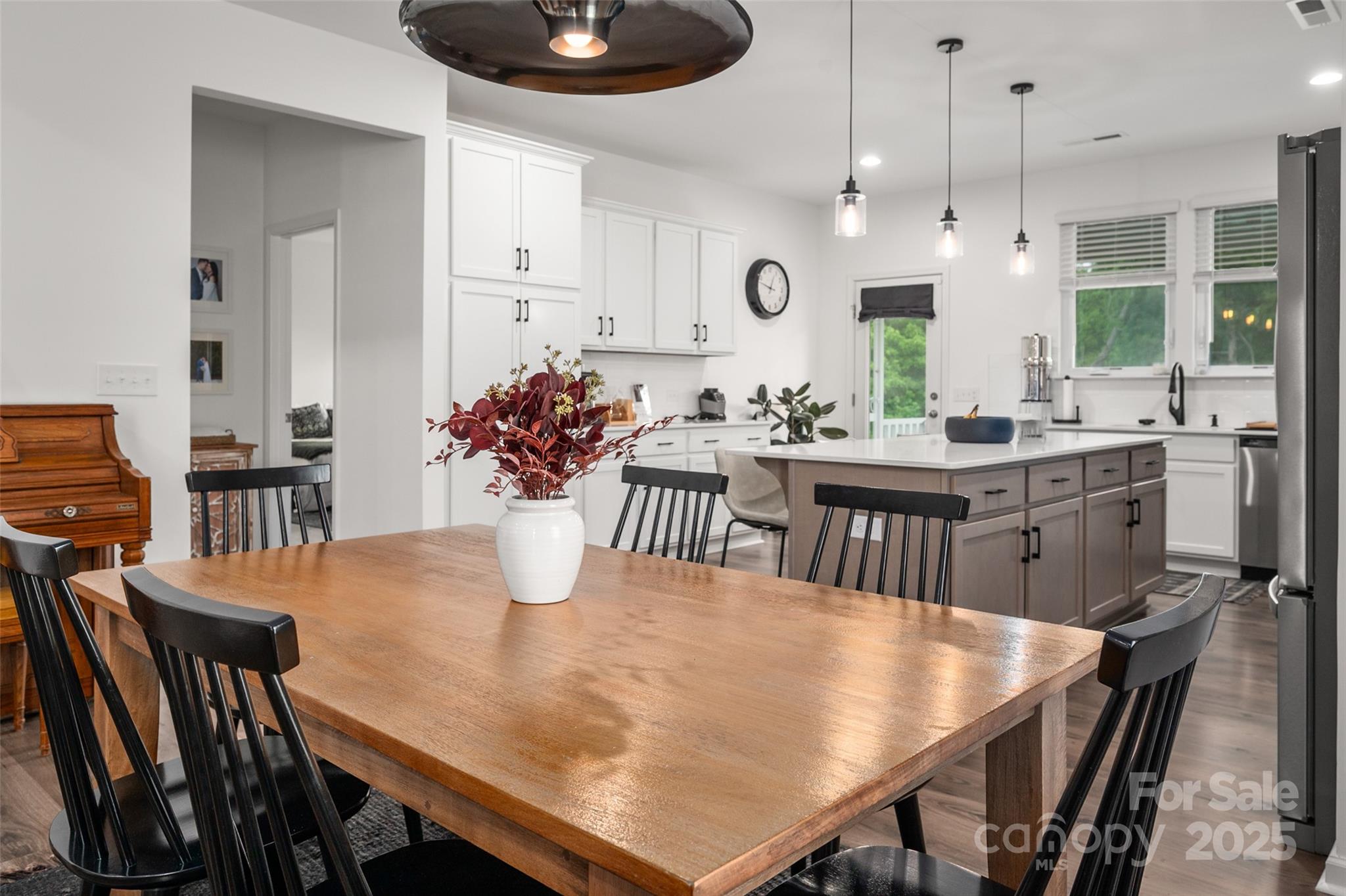 1024 Scotch Meadows Loop, Unit 32 Monroe, NC 28110 - Photo 5 of 19 a dining room with furniture and window