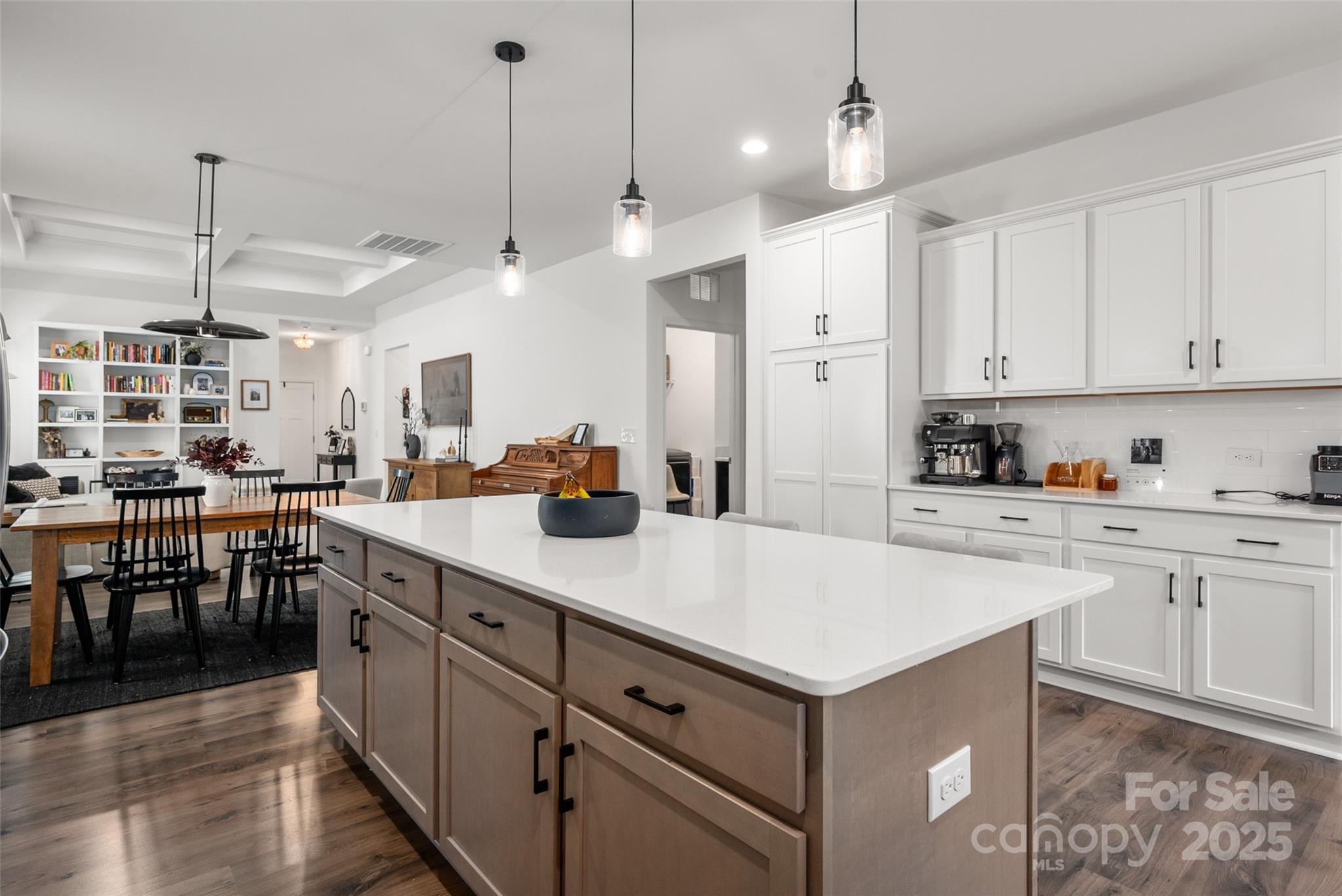 1024 Scotch Meadows Loop, Unit 32 Monroe, NC 28110 - Photo 6 of 19 a kitchen with white cabinets and sink
