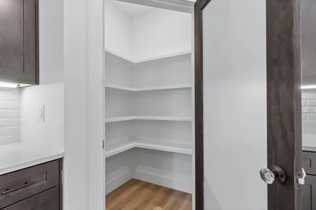 a view of a hallway with closet