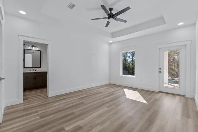 a bathroom with a double vanity sink and mirror