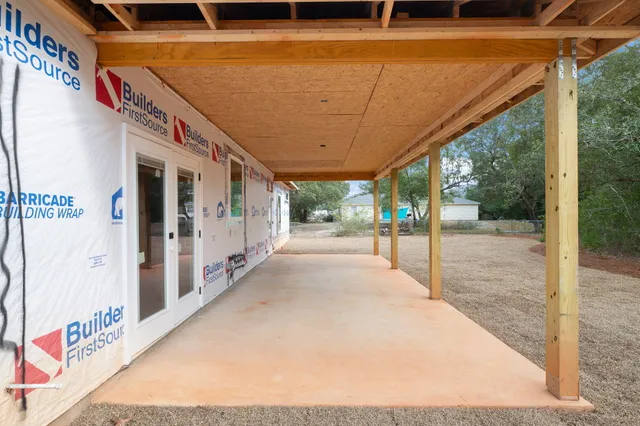 a view of backyard with green space