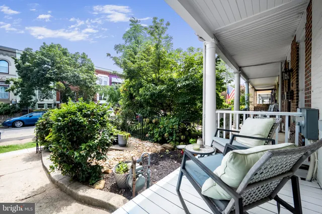 a view of a chairs and table in the patio