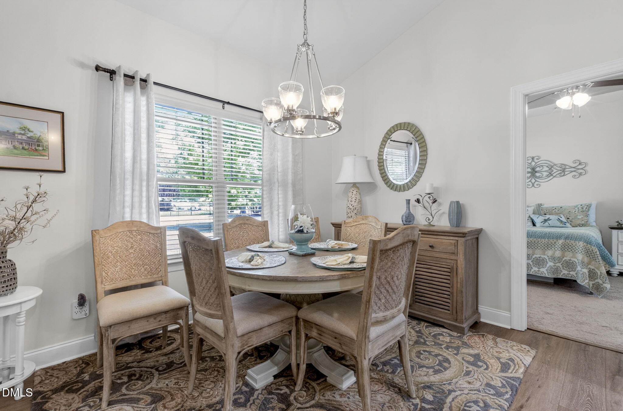20 Deep Clay Circle Angier, NC 27501 - Photo 17 of 54 a view of a dining room with furniture window and wooden floor