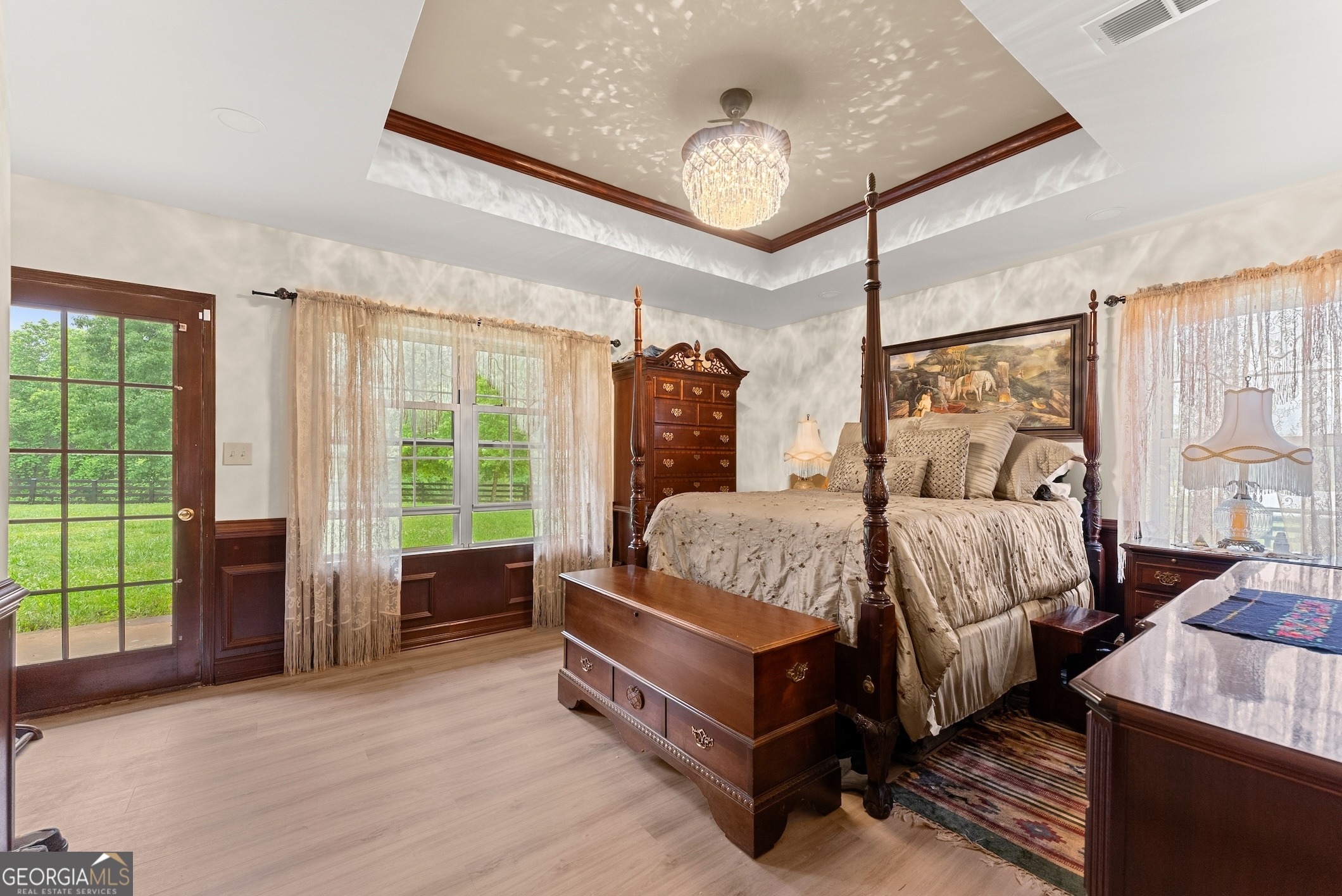 7215 Kelly Bridge Road Dawsonville, GA 30534 - Photo 12 of 87 a spacious bedroom with a bed and a large window