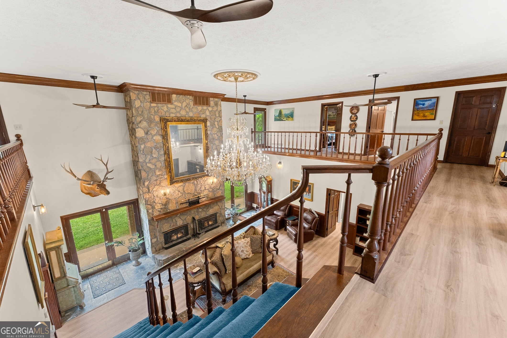 7215 Kelly Bridge Road Dawsonville, GA 30534 - Photo 19 of 87 a view of an entryway with wooden floor and windows