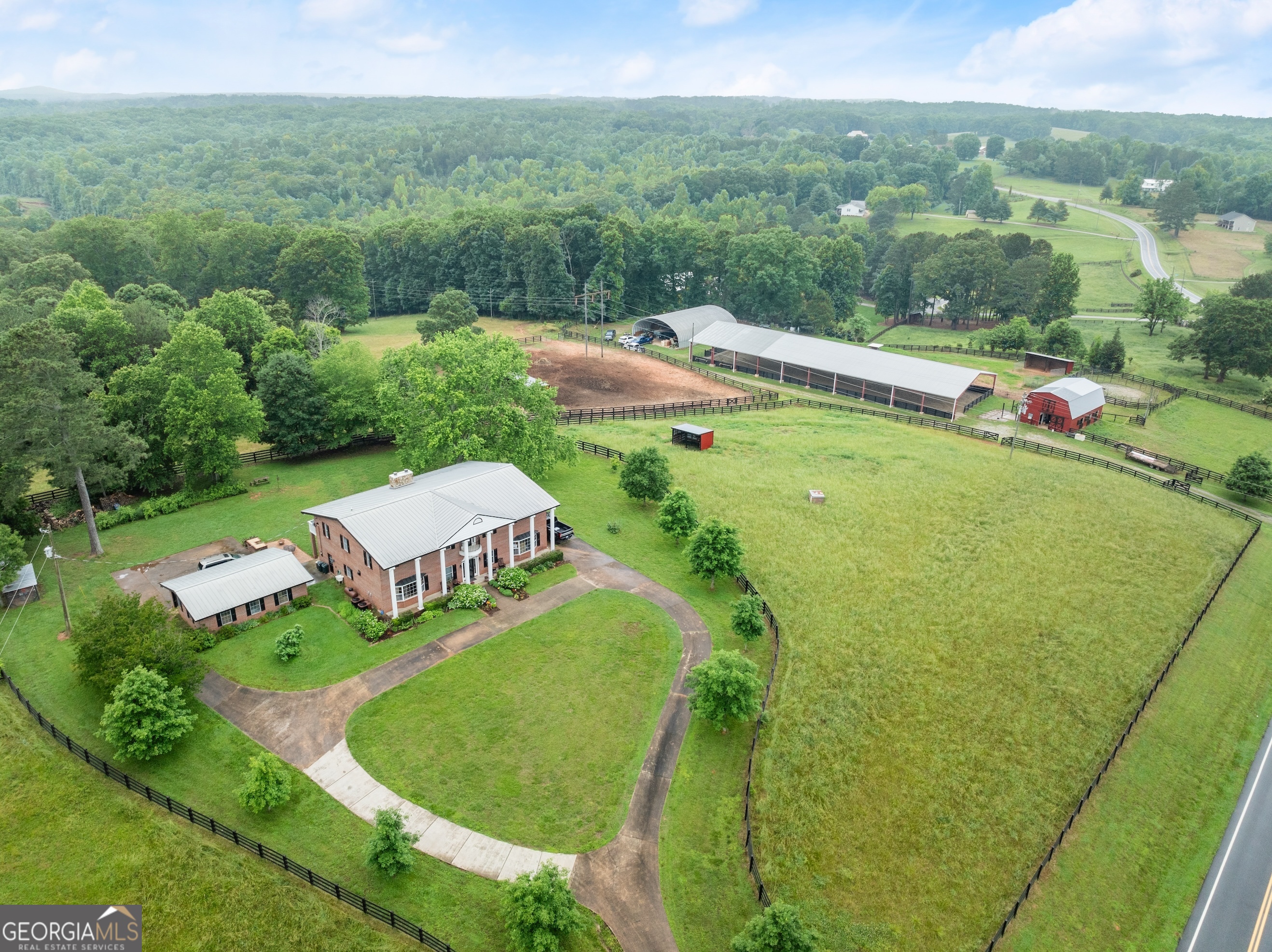 7215 Kelly Bridge Road Dawsonville, GA 30534 - Photo 2 of 87 a view of a swimming pool with a garden and trees