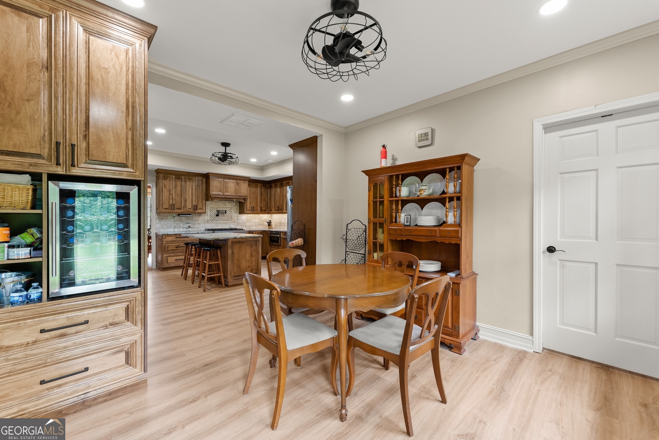 7215 Kelly Bridge Road Dawsonville, GA 30534 - Photo 42 of 87 a view of a dining room with furniture window and wooden floor
