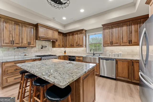 a view of a park with a bench and trees