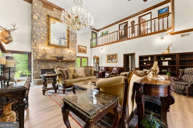 a spacious bedroom with a bed and a large window