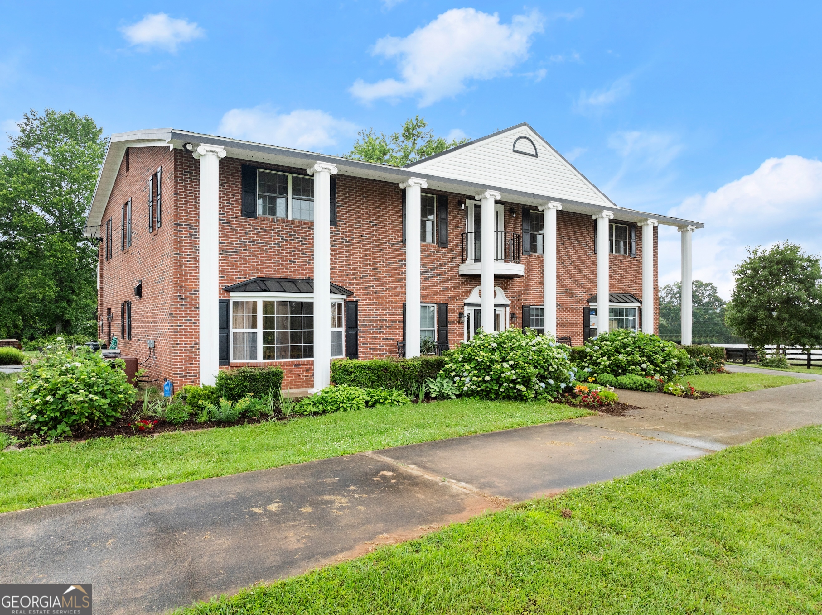7215 Kelly Bridge Road Dawsonville, GA 30534 - Photo 87 of 87 a front view of a house with a yard