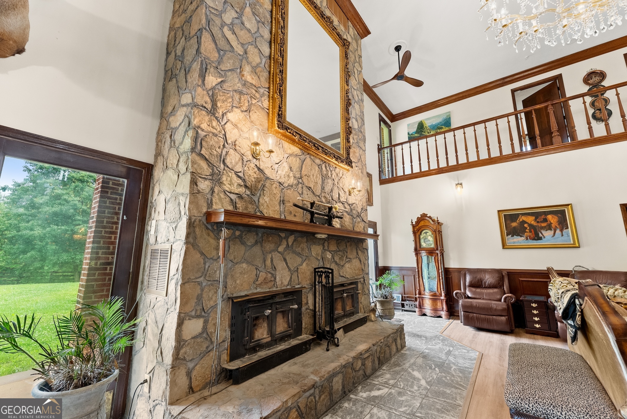 7215 Kelly Bridge Road Dawsonville, GA 30534 - Photo 10 of 87 a living room with furniture a flat screen tv and a fireplace