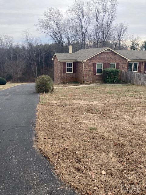 230 Deer Path Rustburg, VA 24588 - Photo 17 of 25 a front view of house with yard and trees around