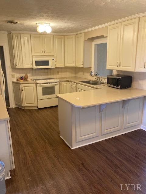 230 Deer Path Rustburg, VA 24588 - Photo 2 of 25 a kitchen with stainless steel appliances sink refrigerator and cabinets
