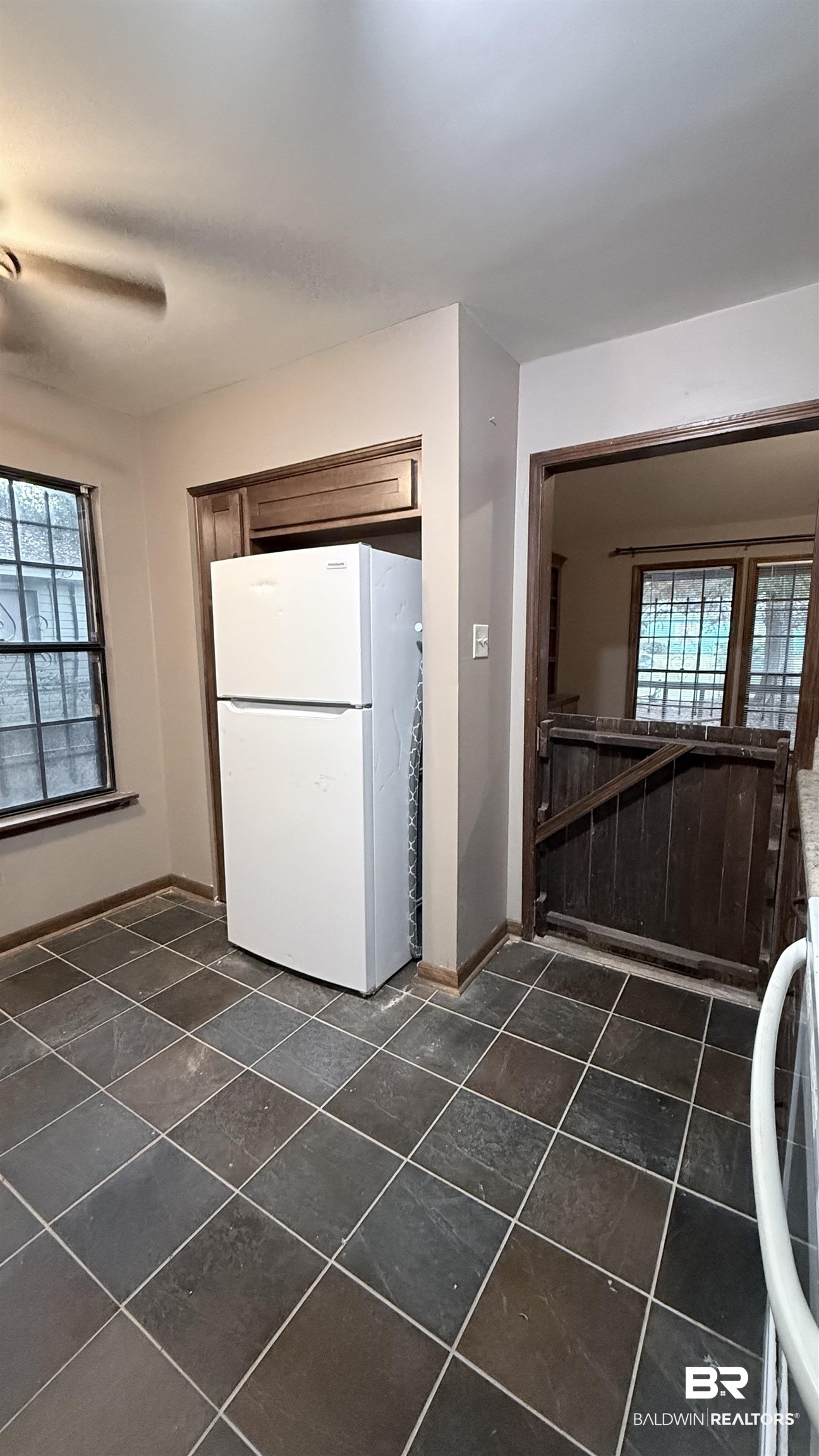 4131 Springdale Road Mobile, AL 36609 - Photo 4 of 28 Kitchen with plenty of natural light and freestanding refrigerator