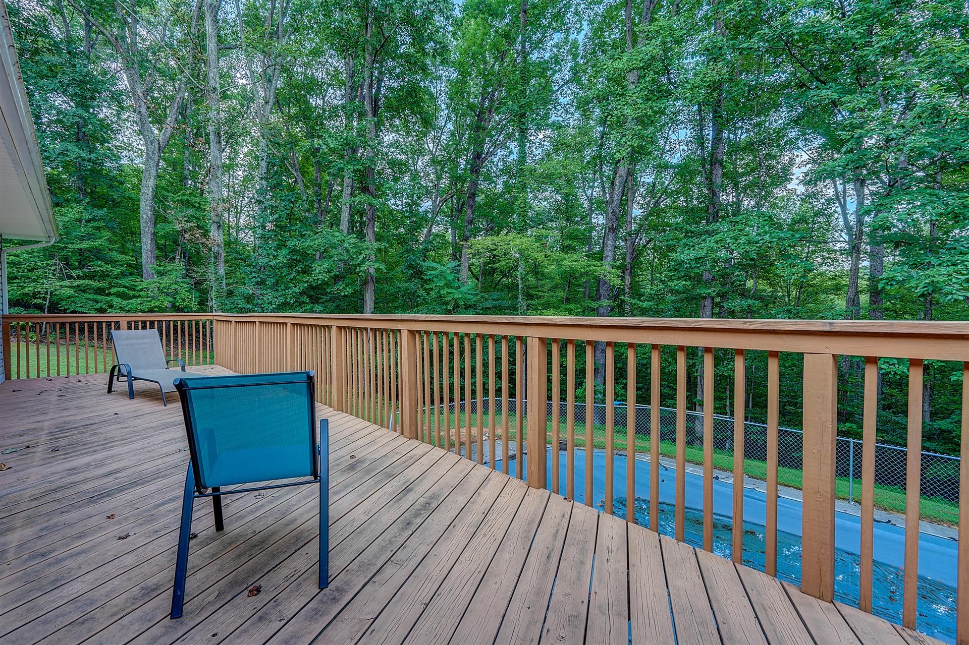5960 Goodview Road Goodview, VA 24095 - Photo 31 of 38 a wooden bench sitting on top of a wooden deck
