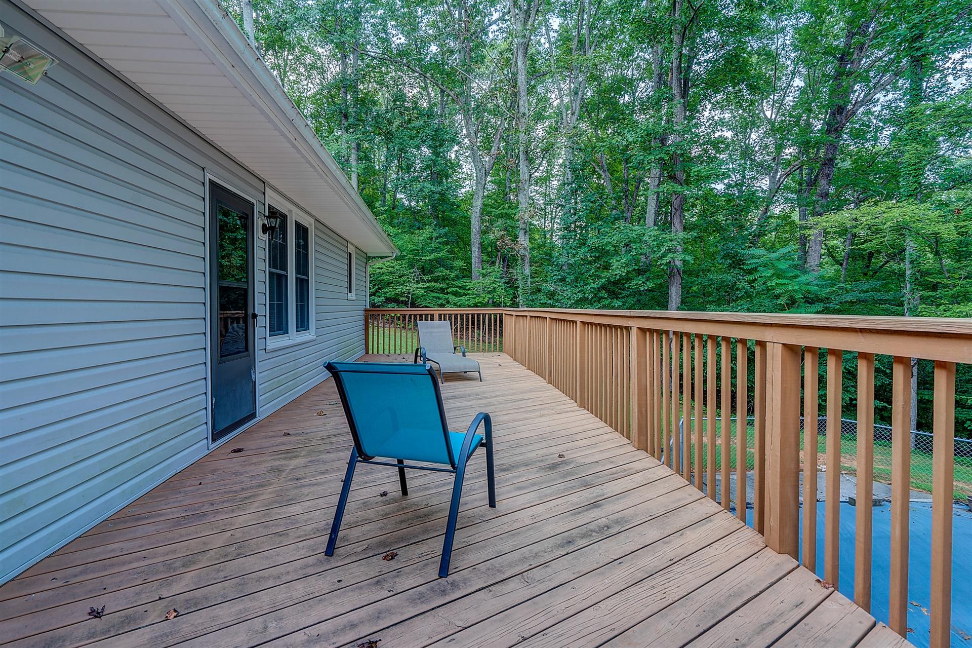 5960 Goodview Road Goodview, VA 24095 - Photo 32 of 38 a view of a wooden chairs on deck