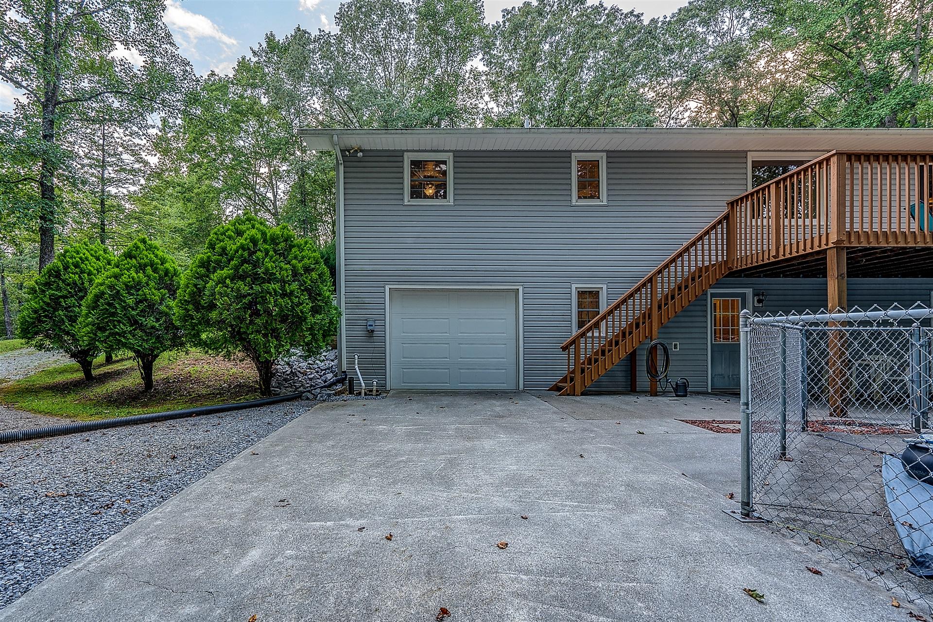 5960 Goodview Road Goodview, VA 24095 - Photo 36 of 38 a view of a house with a yard and stairs