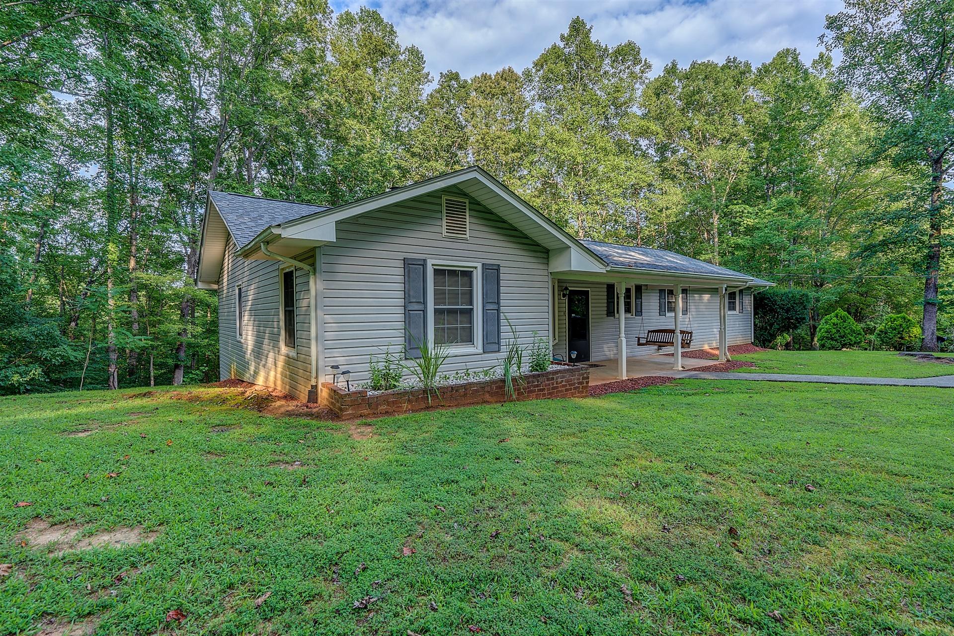 5960 Goodview Road Goodview, VA 24095 - Photo 38 of 38 a front view of a house with a yard