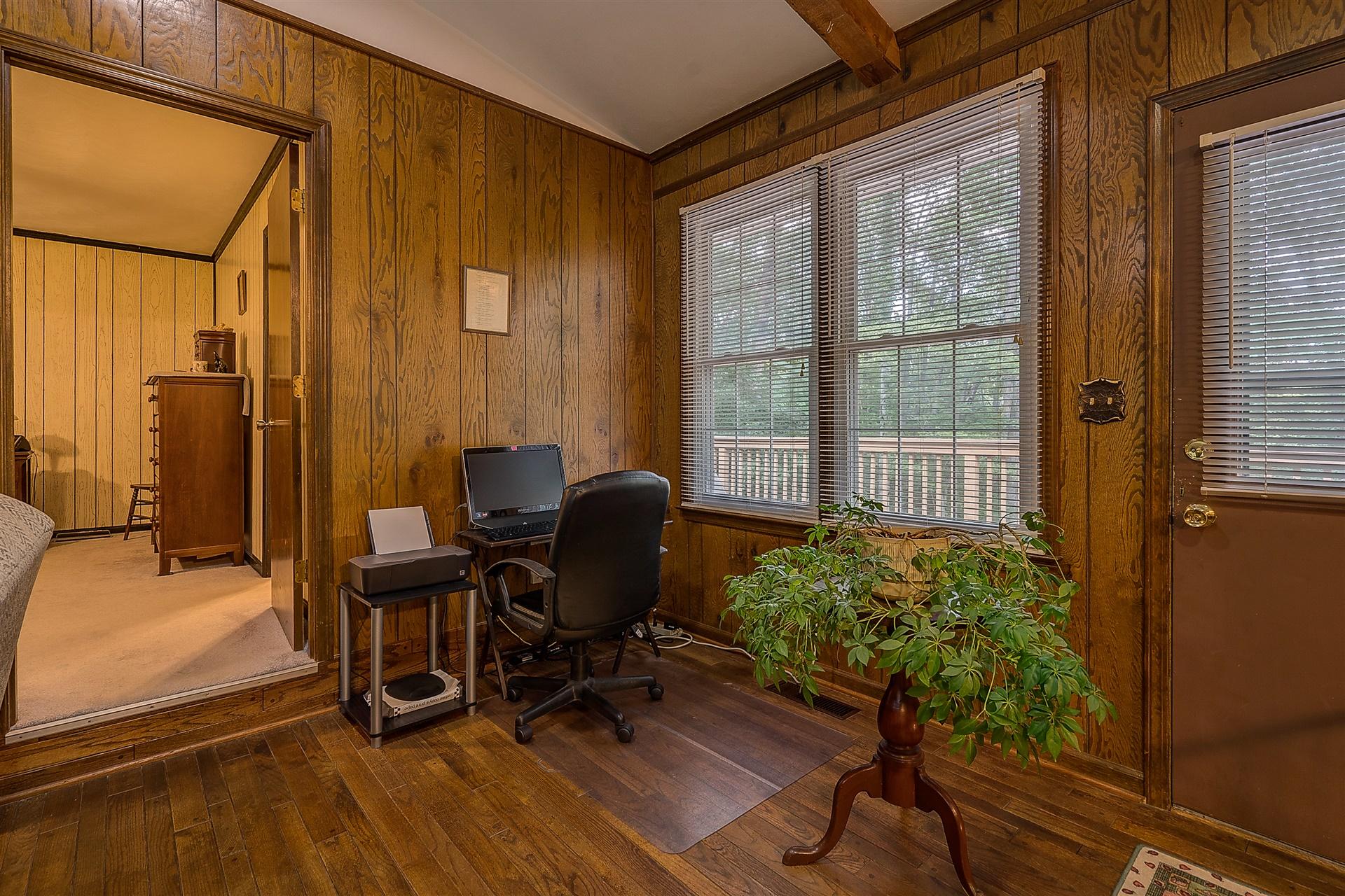 5960 Goodview Road Goodview, VA 24095 - Photo 9 of 38 a workspace with furniture and a window