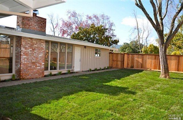488 Las Colindas Road San Rafael, CA 94903 - Photo 1 of 1 a view of backyard with potted plants and a large tree