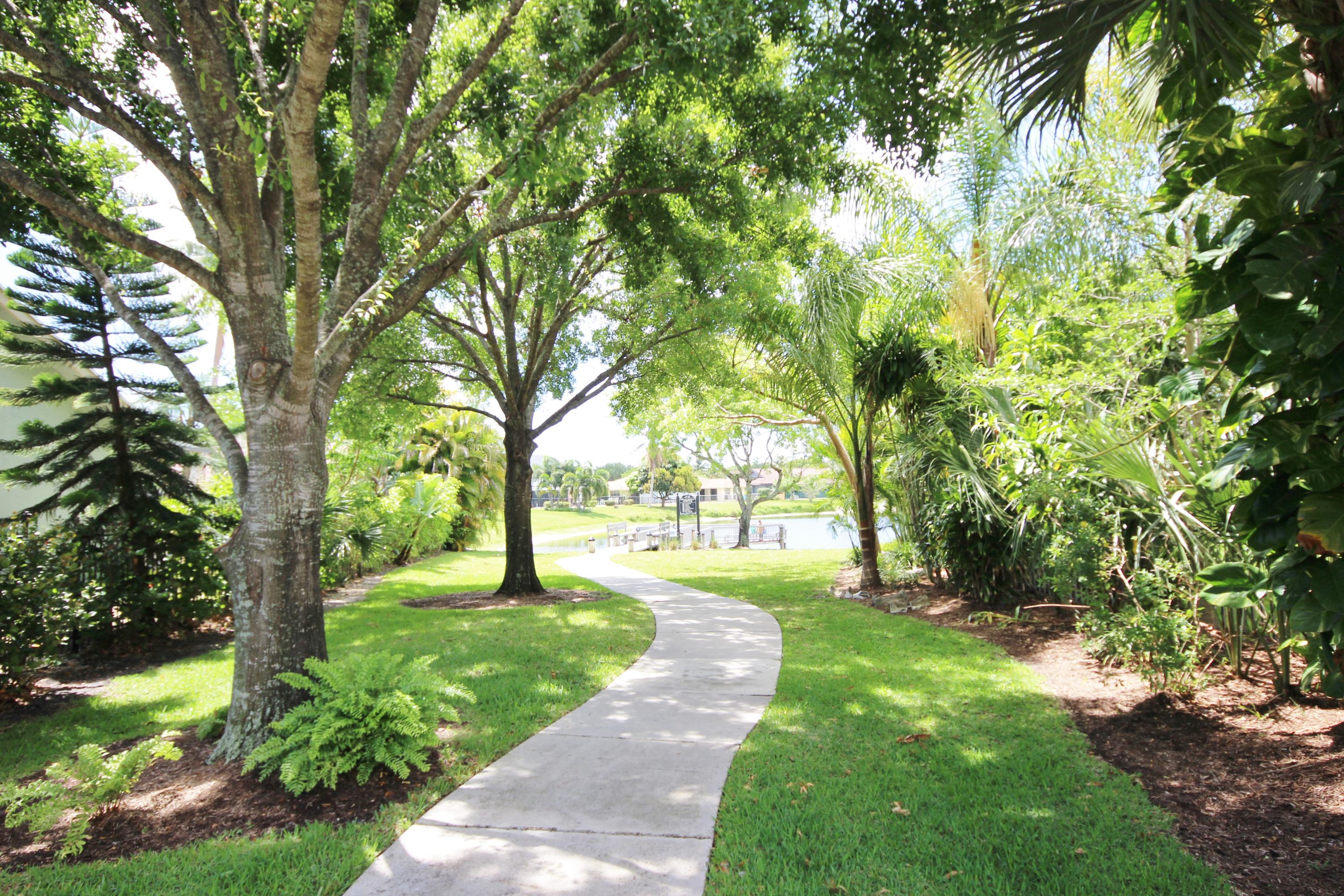 4816 Sugar Pine Drive Boca Raton, FL 33487 - Photo 34 of 37 Lake Entrance
