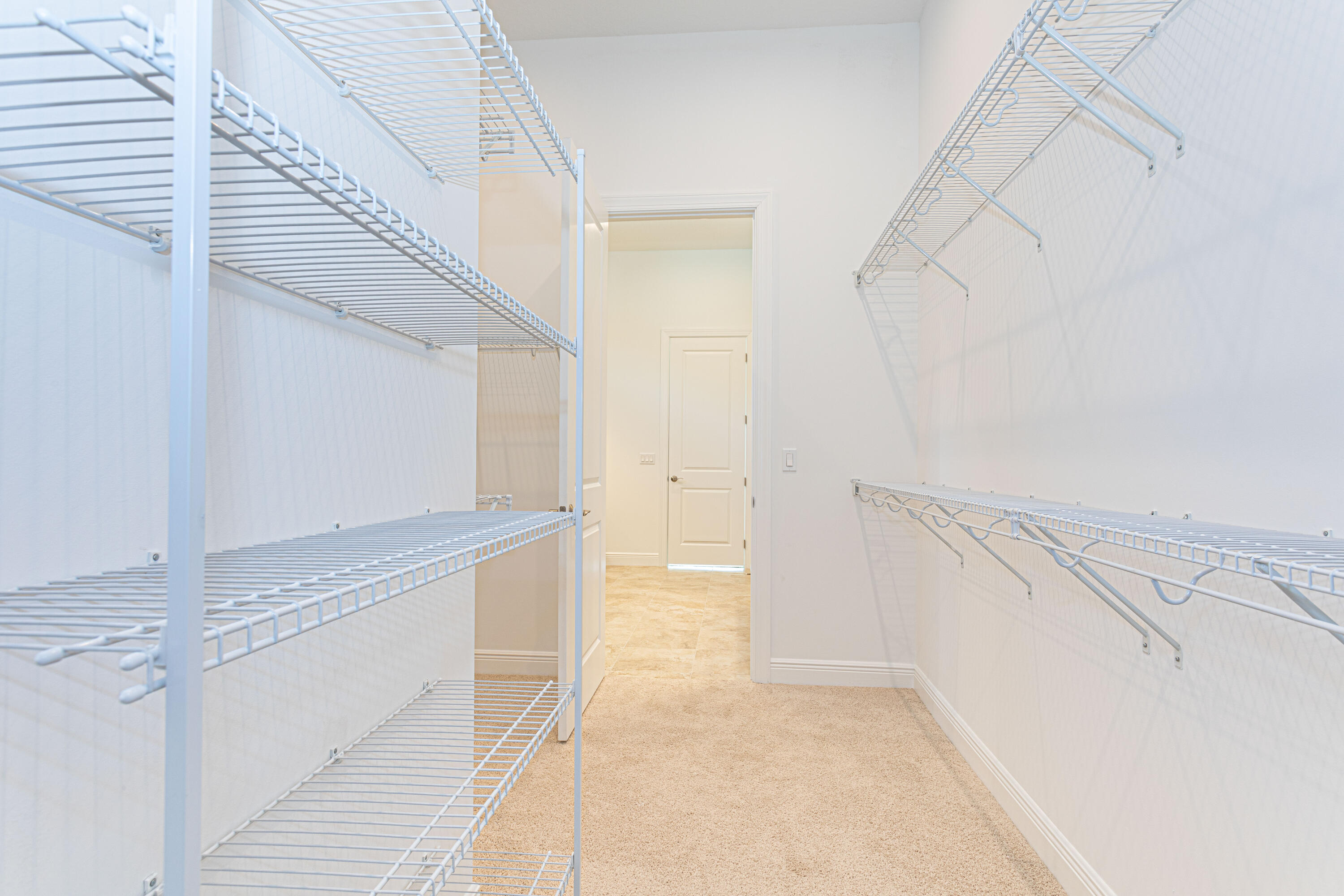 9155 Southwest Esule Way Port St. Lucie, FL 34987 - Photo 24 of 49 a view of storage and utility room