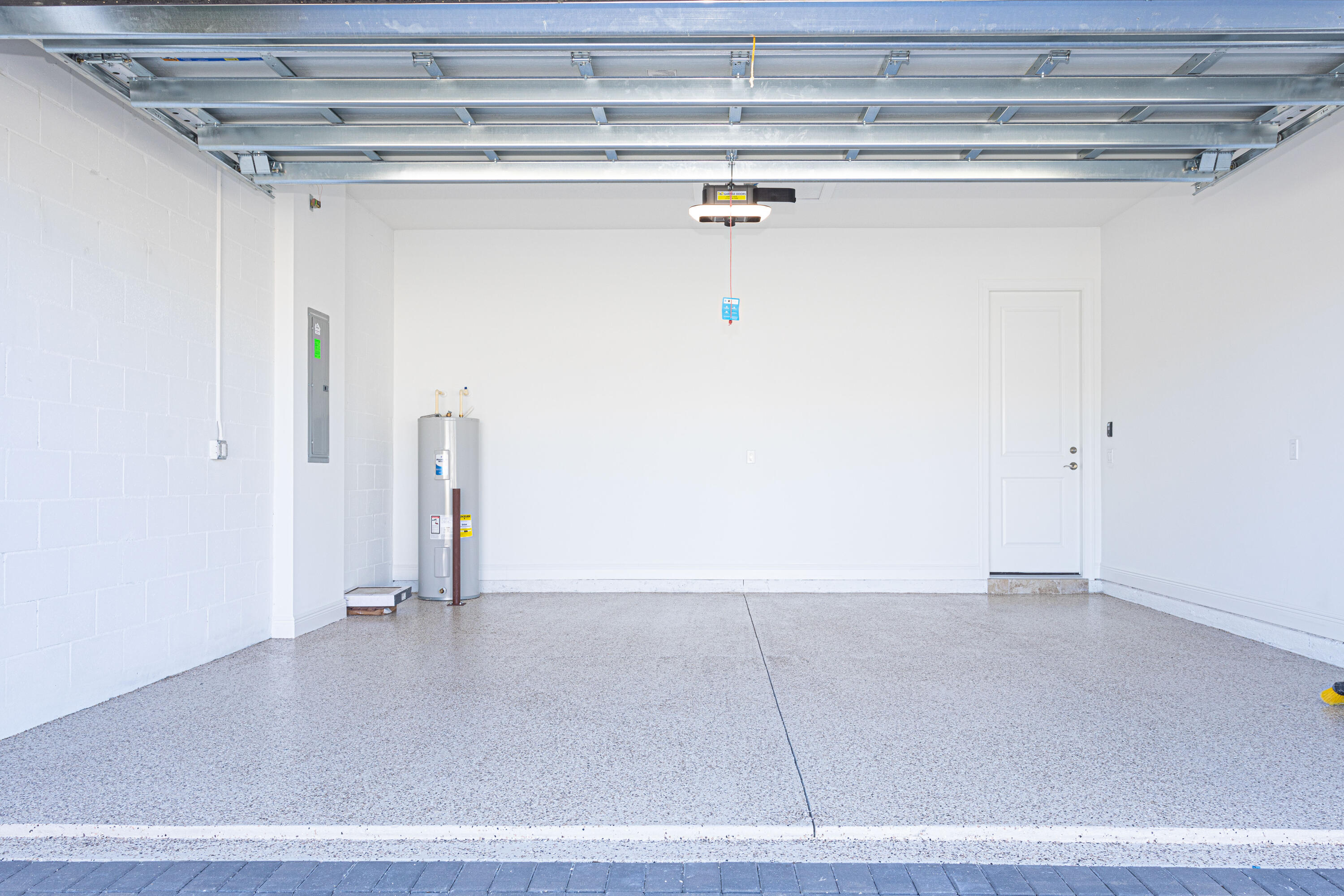 9155 Southwest Esule Way Port St. Lucie, FL 34987 - Photo 35 of 49 a view of a room with racks on the wall