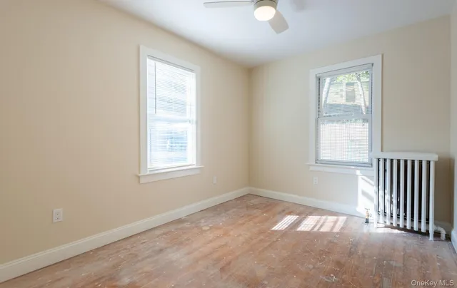 an empty room that has a window