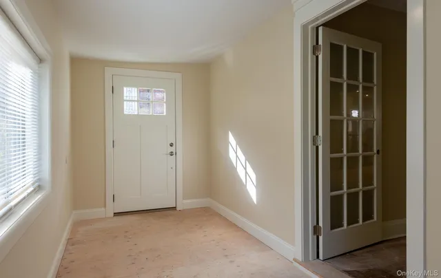 an empty room with windows