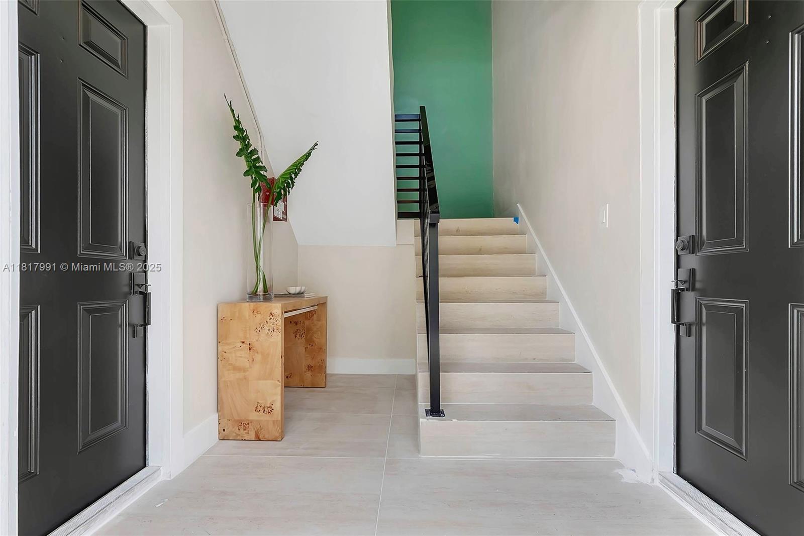 1852 Southwest 22nd Terrace, Unit 1 Miami, FL 33145 - Photo 18 of 24 a view of an entryway with staircase