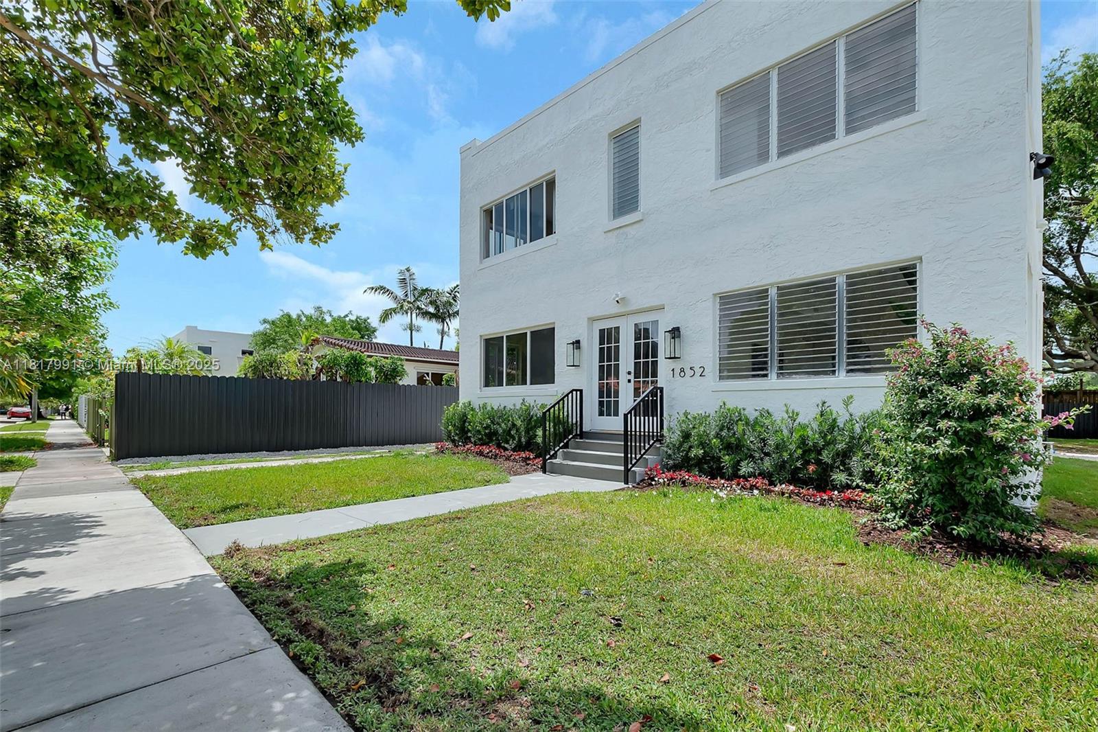 1852 Southwest 22nd Terrace, Unit 1 Miami, FL 33145 - Photo 19 of 24 a view of backyard with a garden and plants