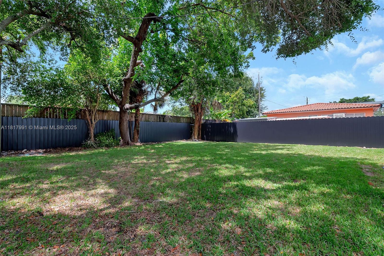 1852 Southwest 22nd Terrace, Unit 1 Miami, FL 33145 - Photo 22 of 24 a yard with tree s
