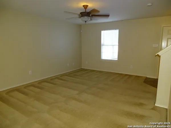 a view of a room with a window