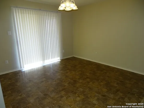 an empty room with a bathroom
