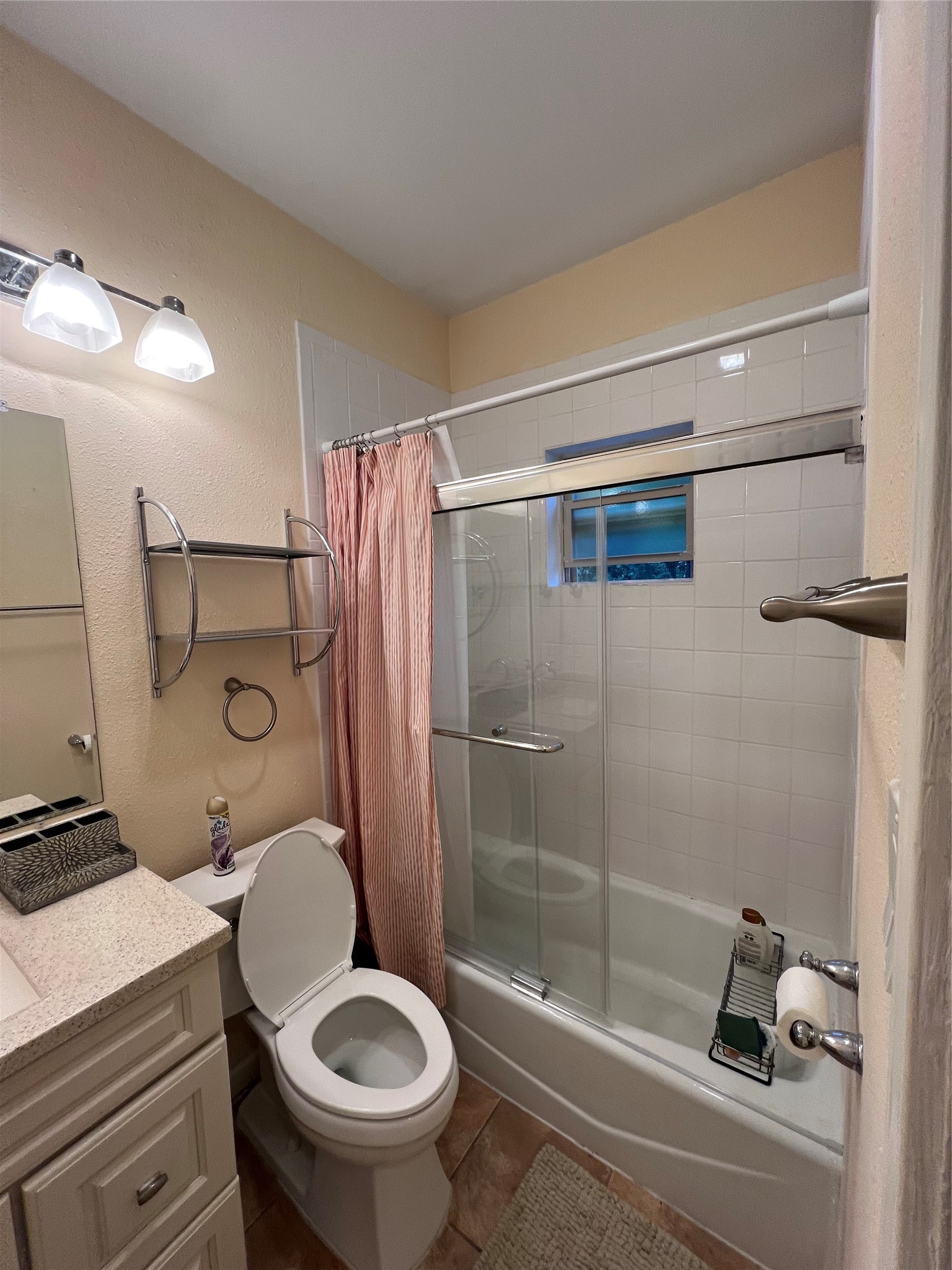 2414 Longview Street, Unit 202 Austin, TX 78705 - Photo 11 of 17 Primary bathroom with vanity and tub
shower combination.