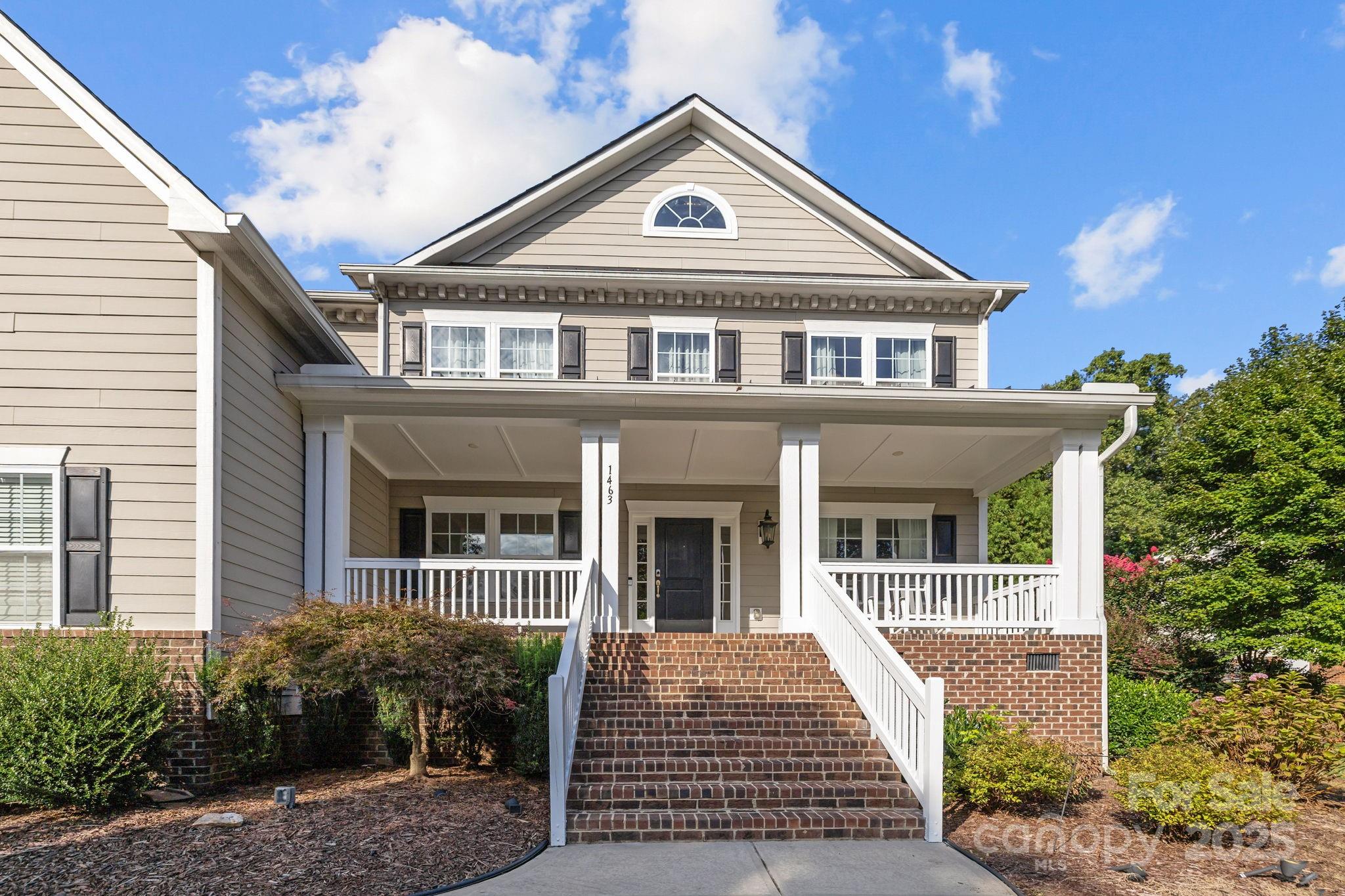 1463 Old Tara Lane Fort Mill, SC 29708 - Photo 3 of 48 a front view of a house with garden